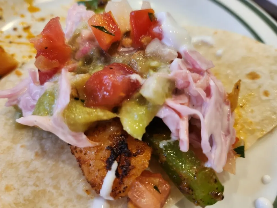 Guacamole pulled pork fries and fajitas