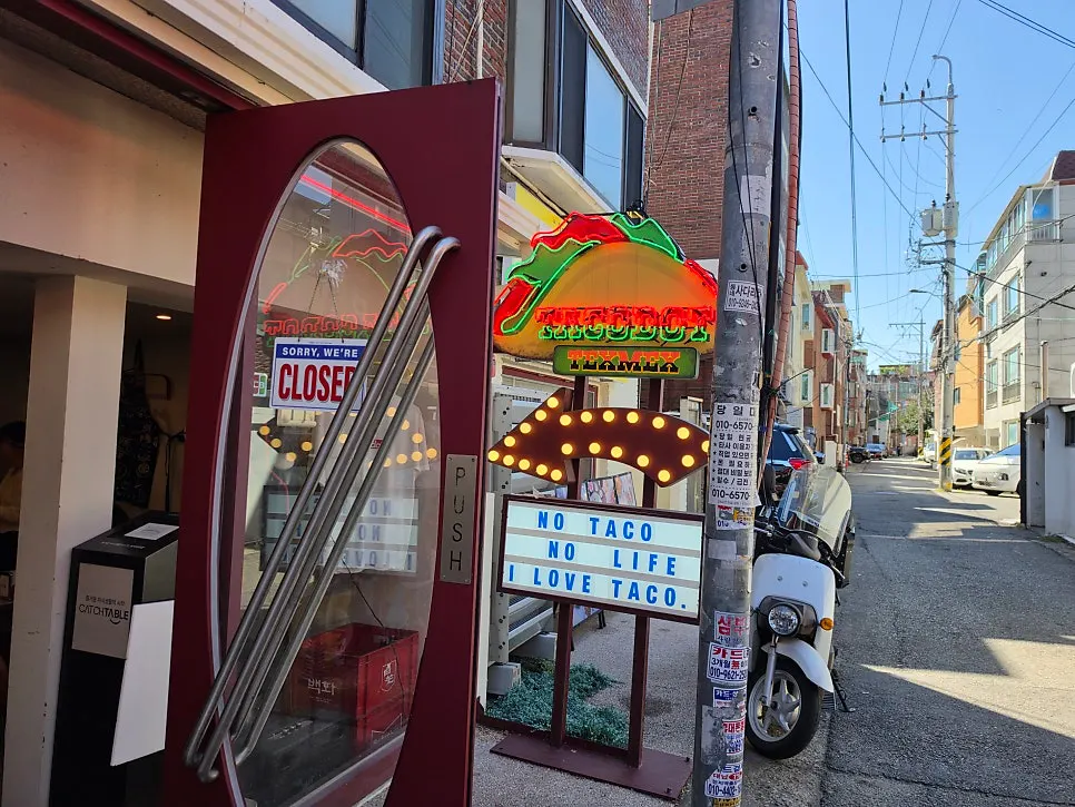 Exterior of Taco Dot Mangwon Market Main Branch, a Mexican restaurant on Mangridan-gil