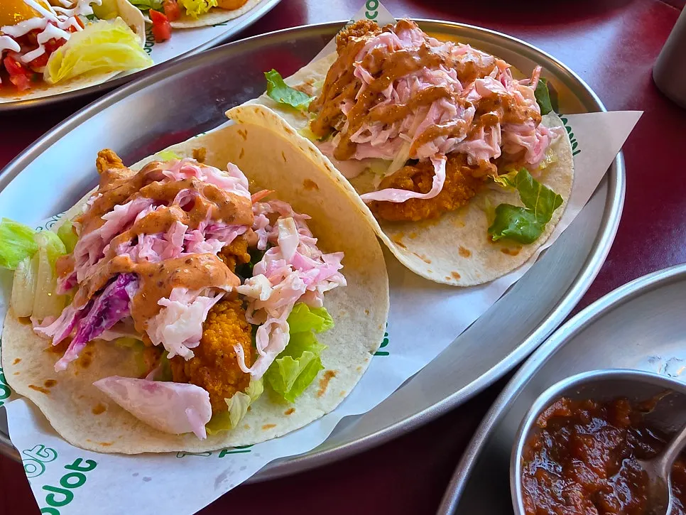 Nashville hot chicken taco piled high with ingredients