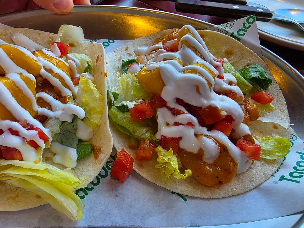 Plump shrimp visible on the mango shrimp taco