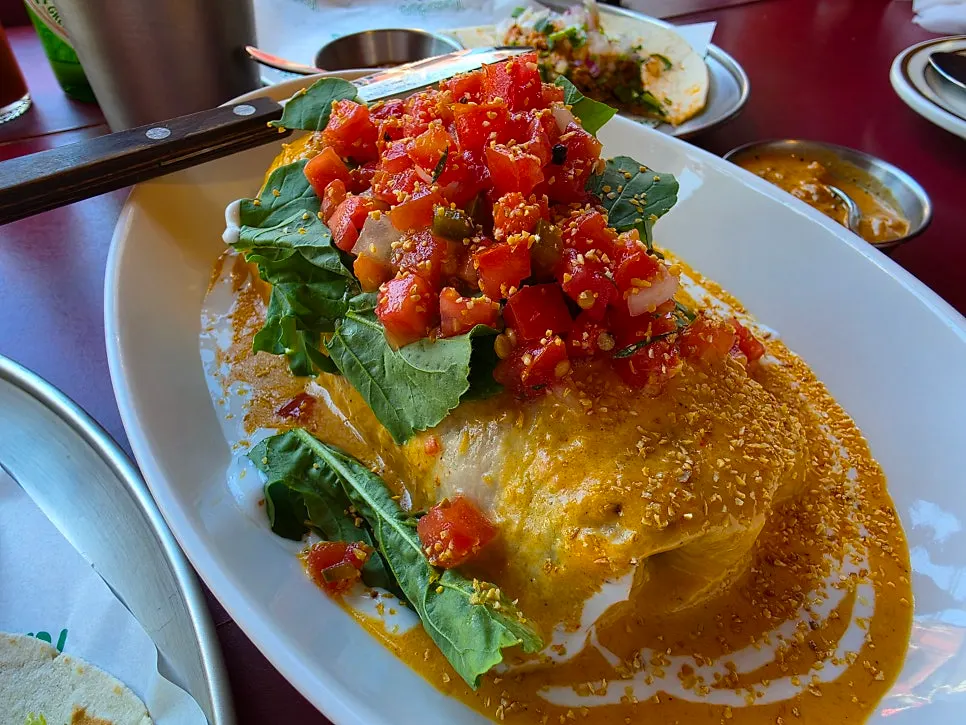 Paprika sauce enchilada served in a large bowl