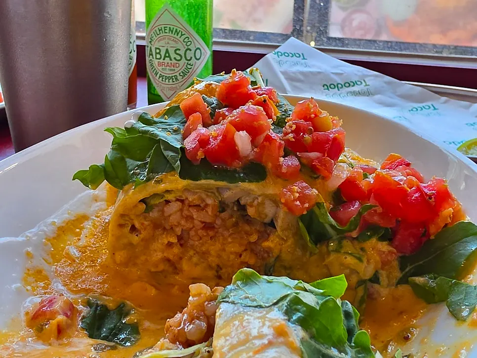Cross-section of the enchilada packed with rice and chicken