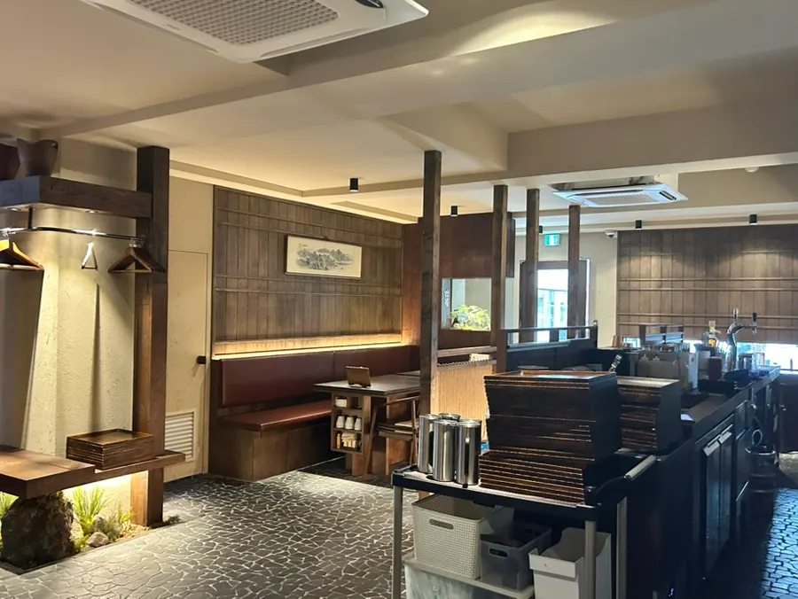 Manmok's interior with wood-toned decor