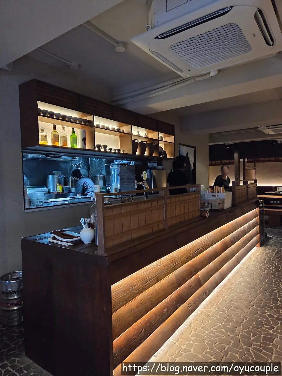 Wood-toned interior of Manmok