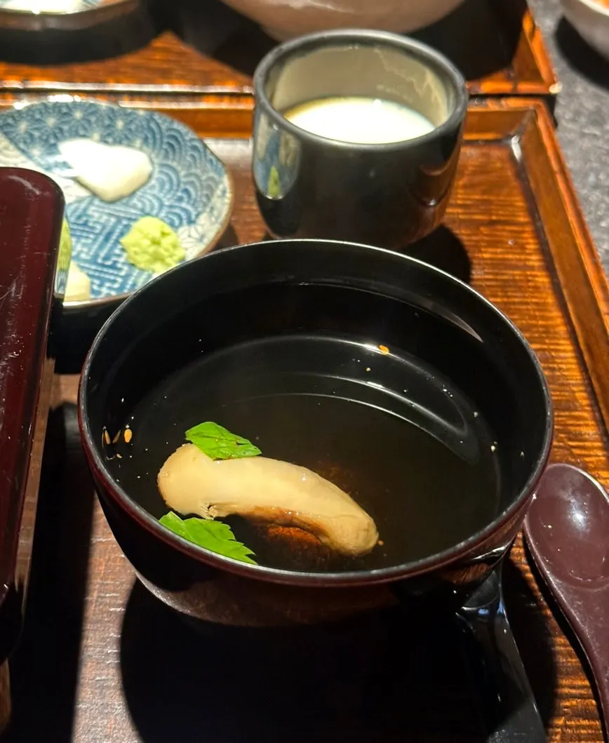 Tray with eel rice bowl lunch box and accompanying side dishes