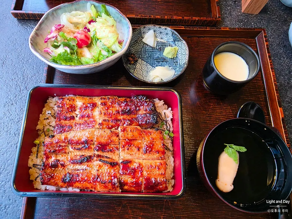 Manmok's full spread with salad, steamed egg custard, and broth