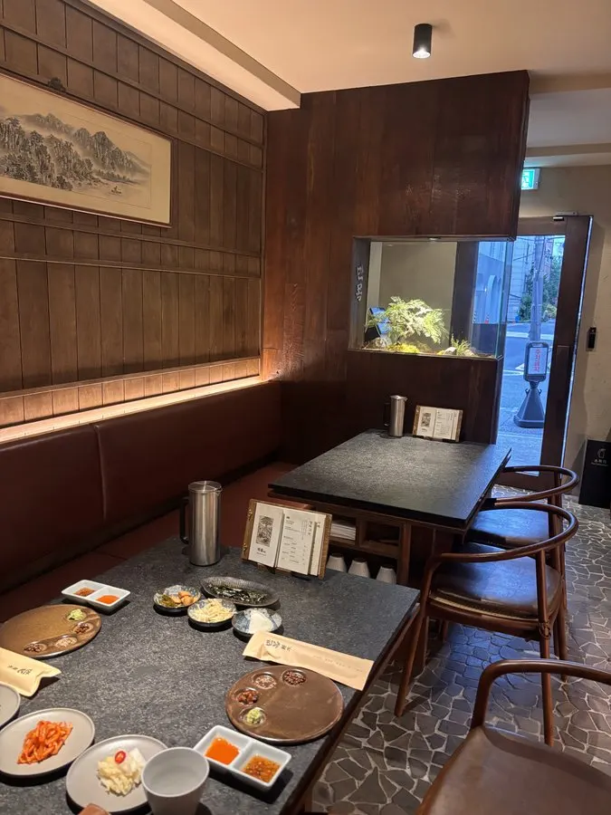 View of Manmok's interior with widely spaced tables