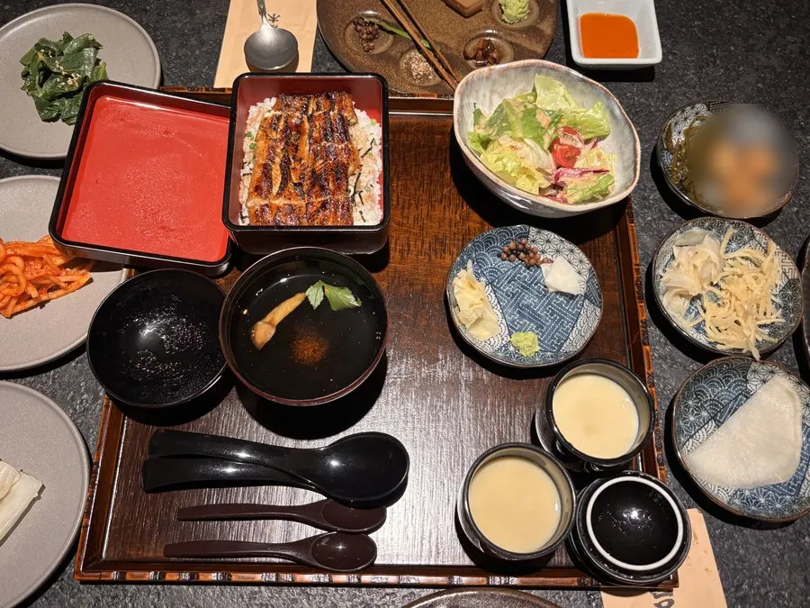 Full table spread with eel rice bowl and hanwoo nabe together
