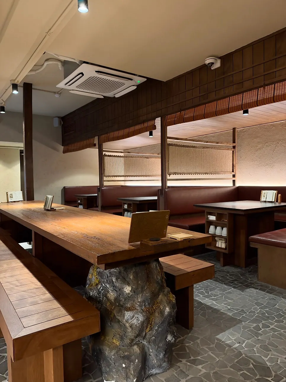 Manmok's indoor seating under calm lighting