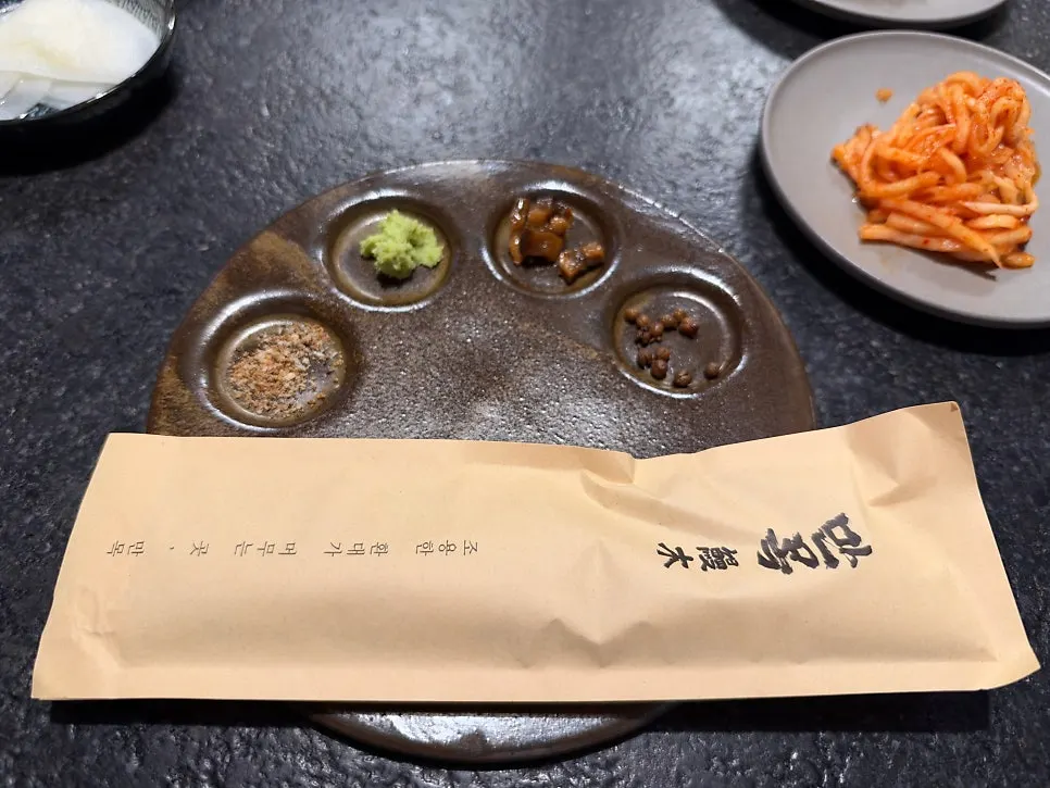 Table full of Manmok's basic side dishes