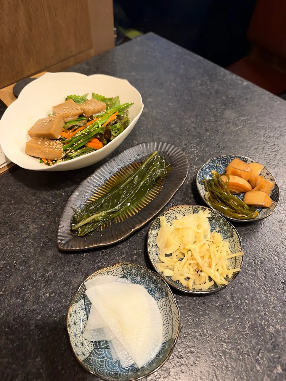 Close-up of pickled radish and other Manmok side dishes