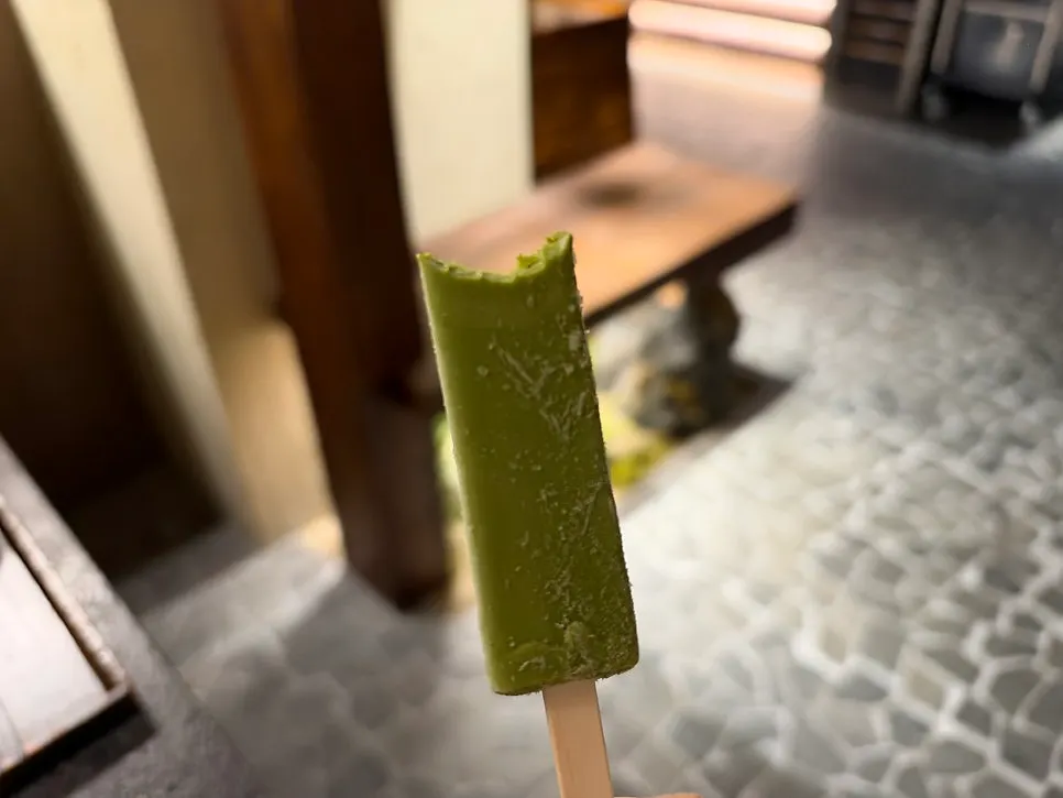 Matcha and black tea ice cream served for dessert