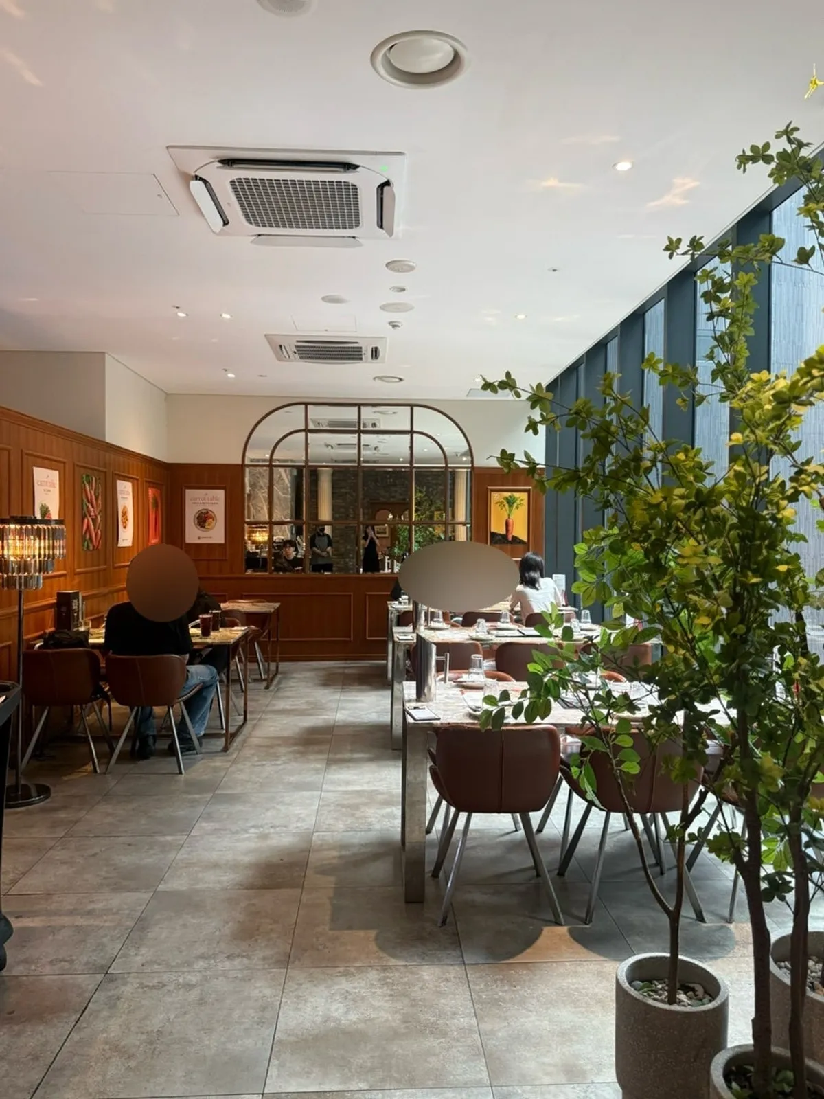 Bright restaurant atmosphere with wood-tone interior