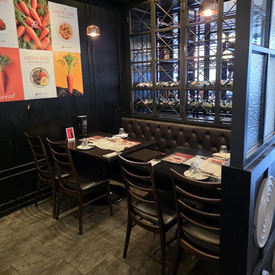 Widely spaced four-person table seating