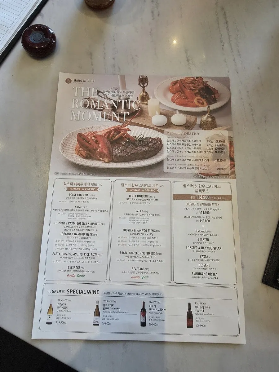 Steak set table setting with garlic bread and drinks