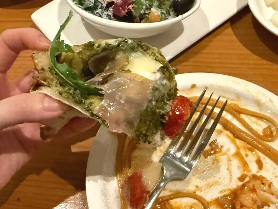 Garden salad served alongside the baguette