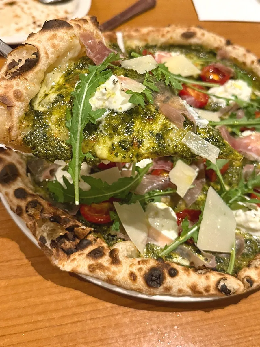 Salad and bread spread at Mano di Chef