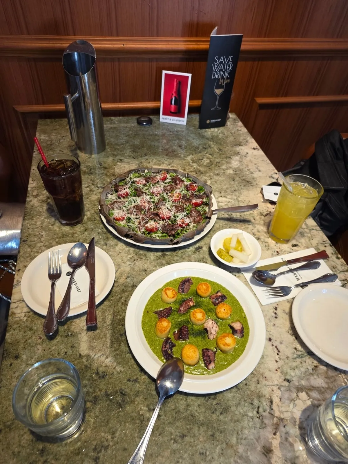 Italian dishes set out on a table at Mano di Chef Gangnam