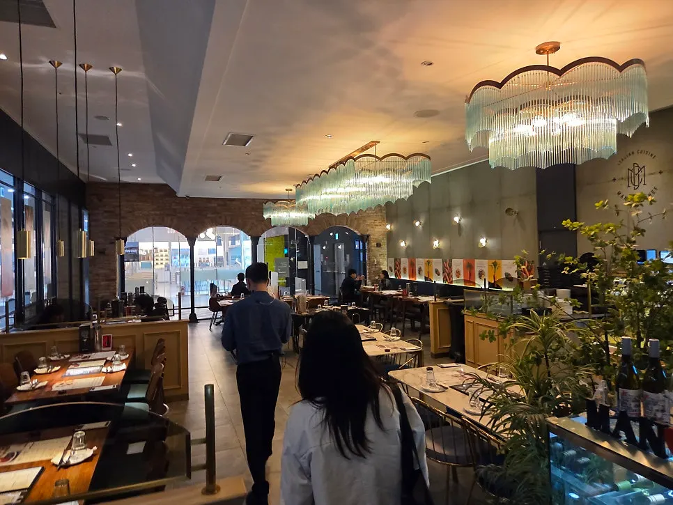 View of store seating with soft lighting