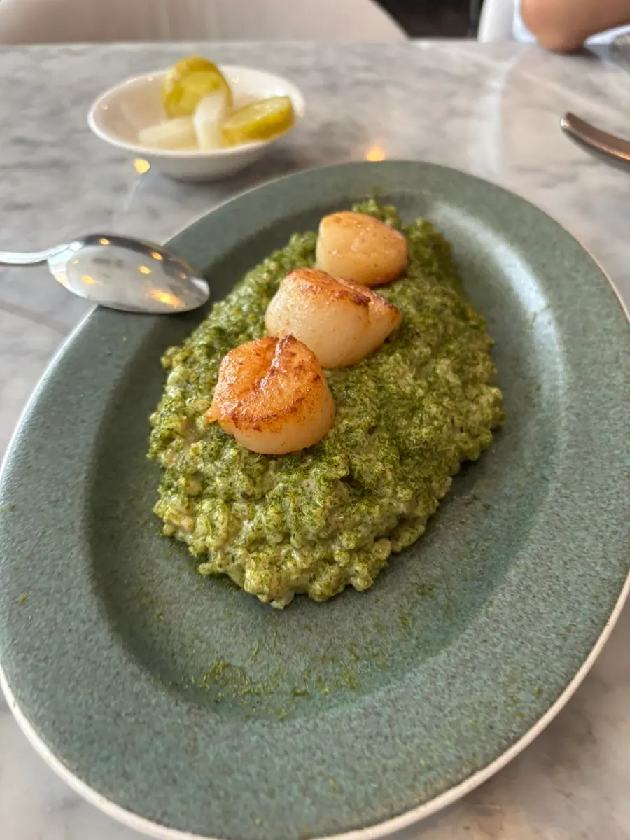 Gamtae pesto seafood barley risotto topped with scallop