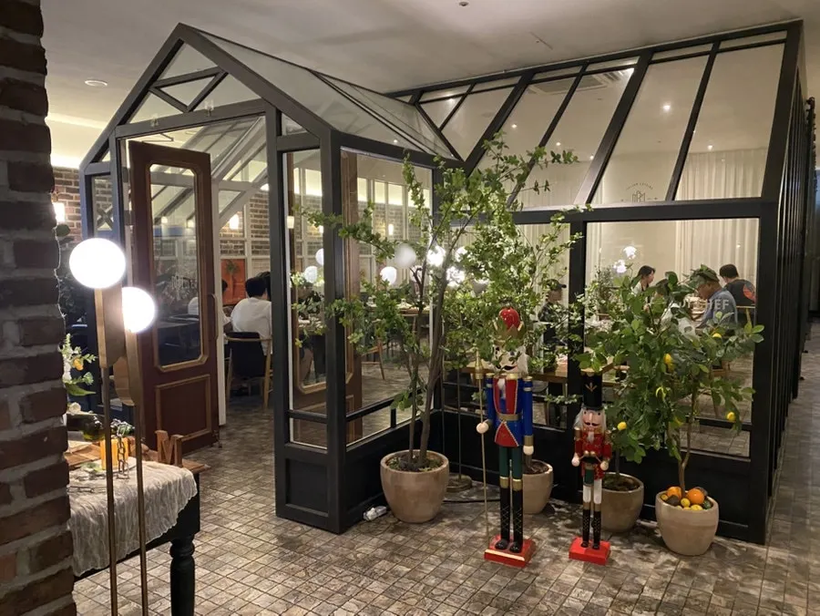 Another seating area further inside the restaurant