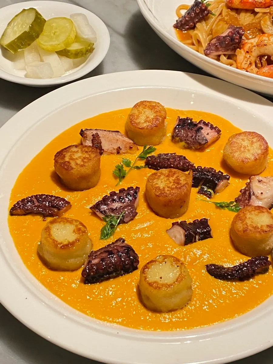 Close-up of the octopus gnocchi plating