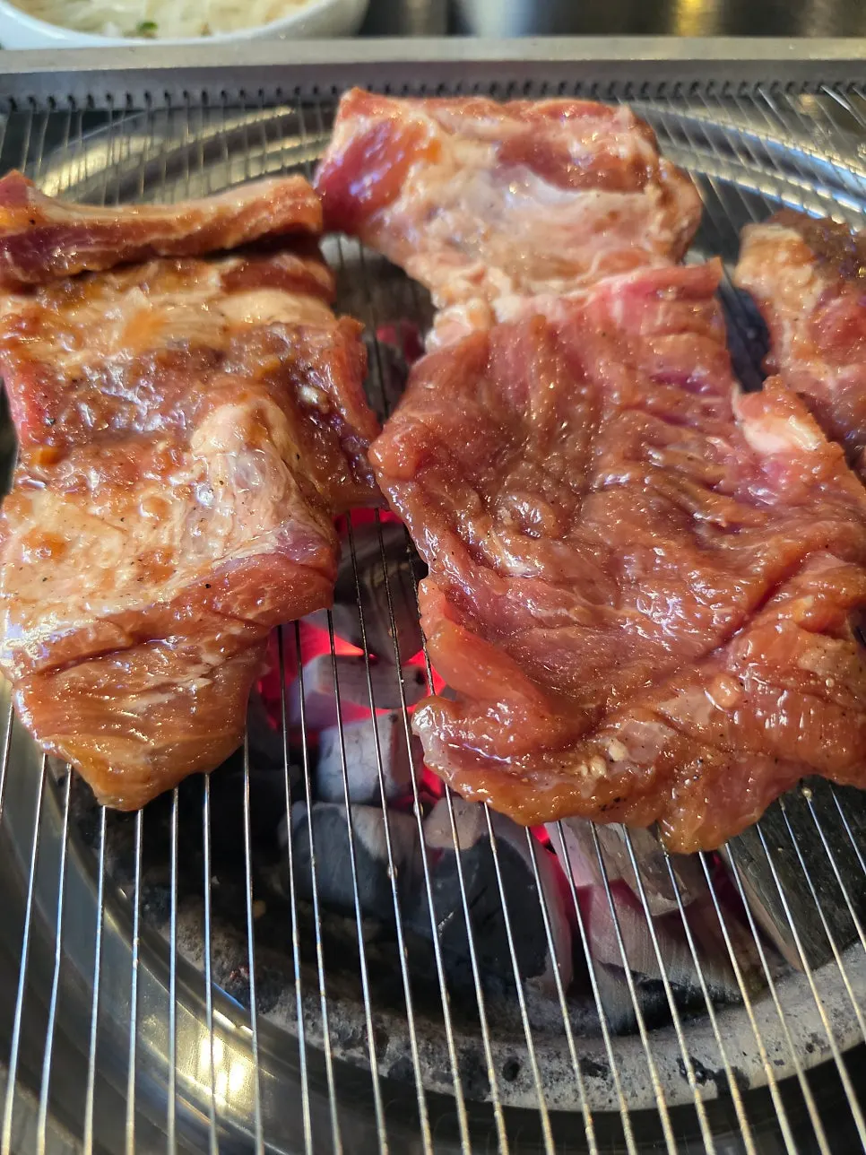 Full galbi restaurant spread served with lettuce