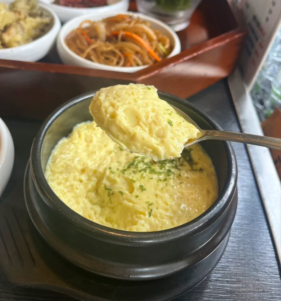 White steamed rice served with the steamed egg