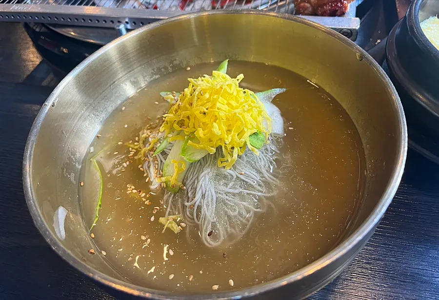 House-made Hamhŭng naengmyeon provided free per person
