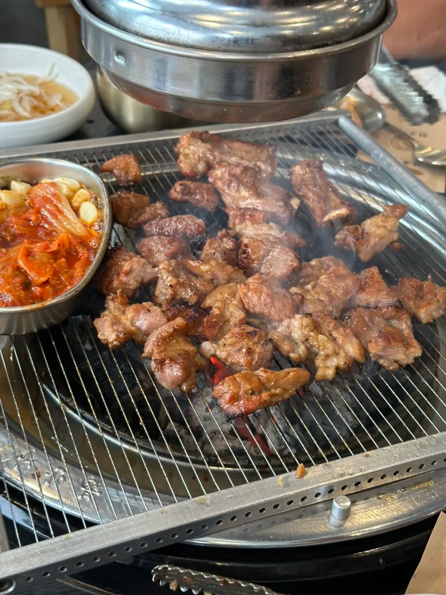 Charcoal grill cooking the extra 2 servings
