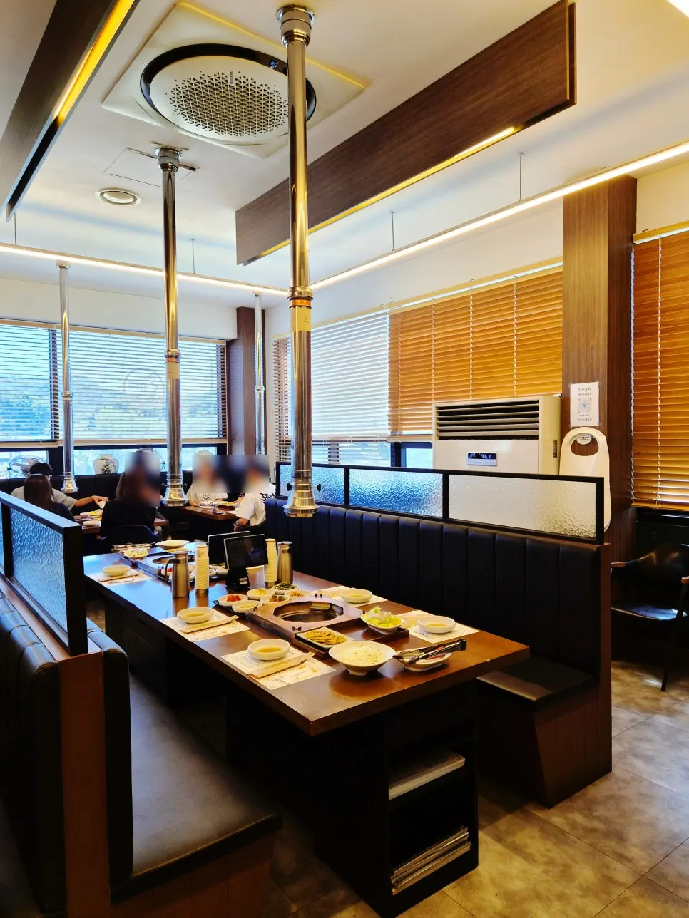 Spacious partitioned booths on the 2nd floor
