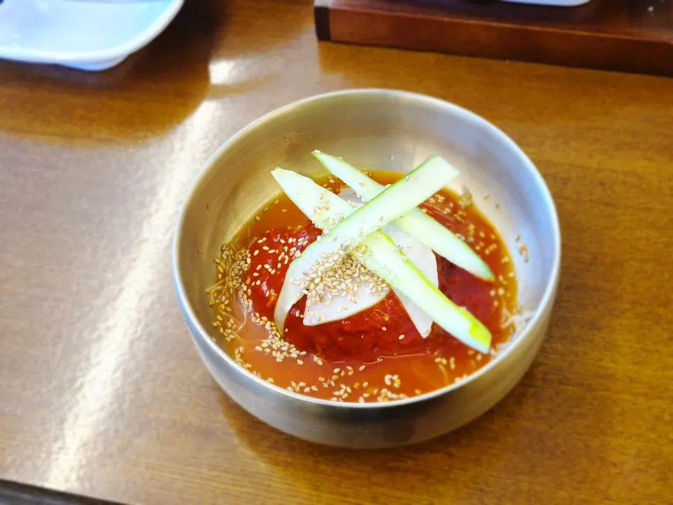 Bowl of free dessert naengmyeon