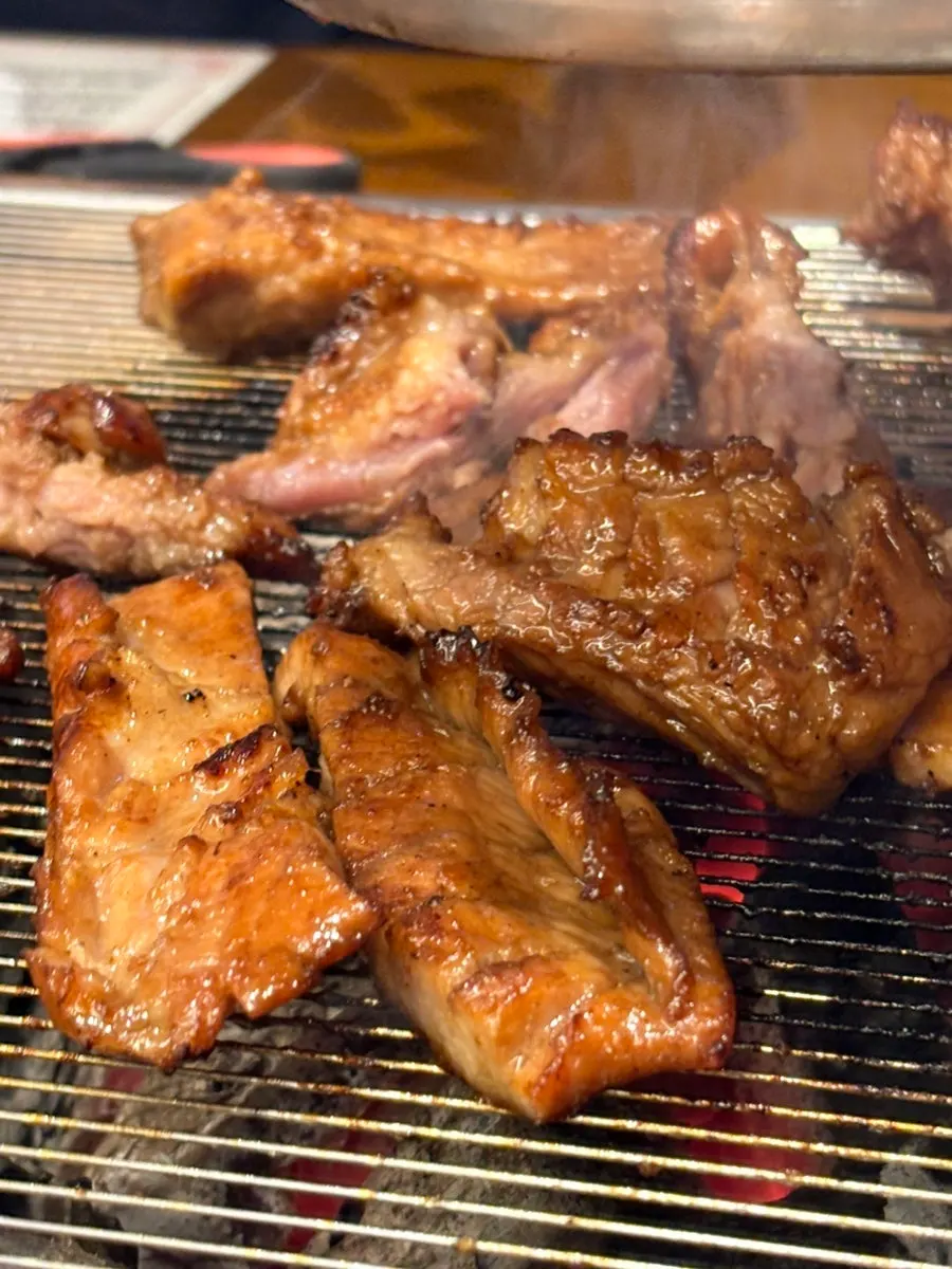 A piece of tender, well-cooked marinated galbi