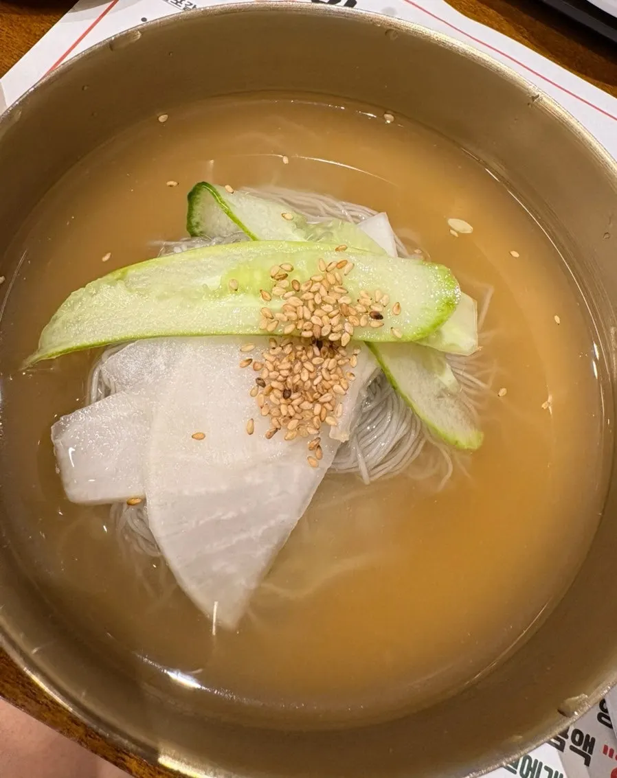 Water naengmyeon with a saved piece of marinated galbi