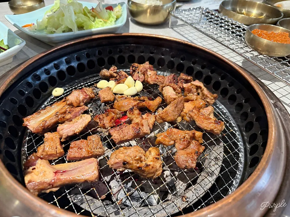 A grilled piece of pork galbi with smoky char