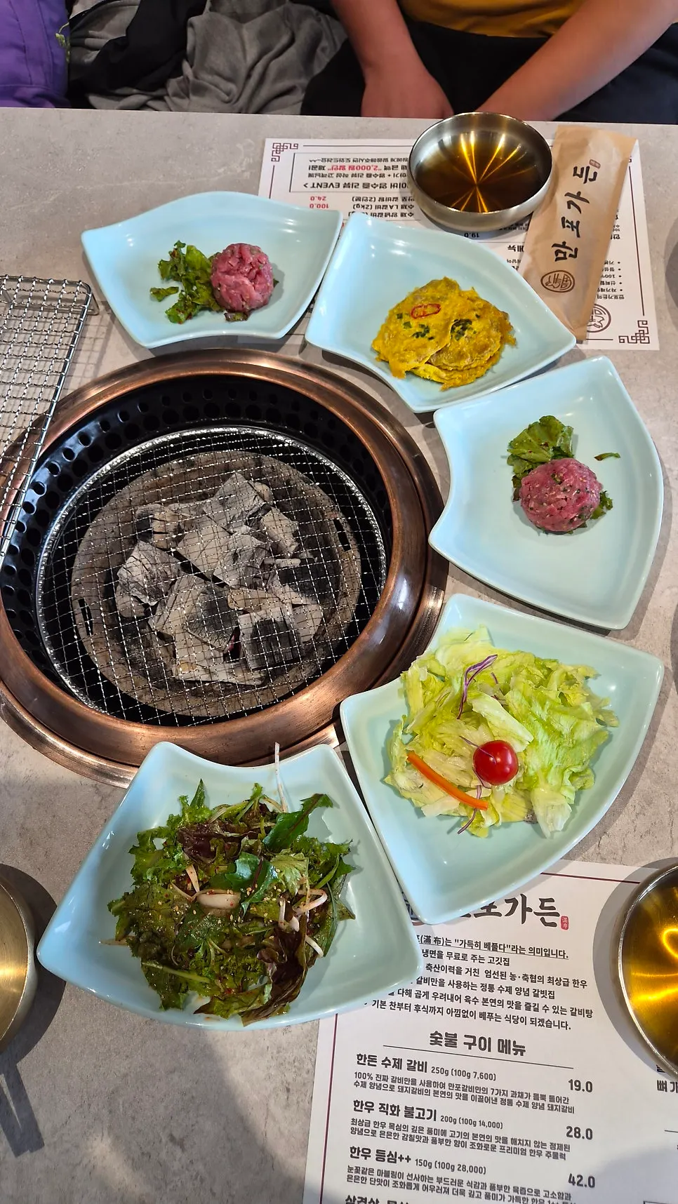 Basic table spread served with the charcoal grill at Manpo Garden