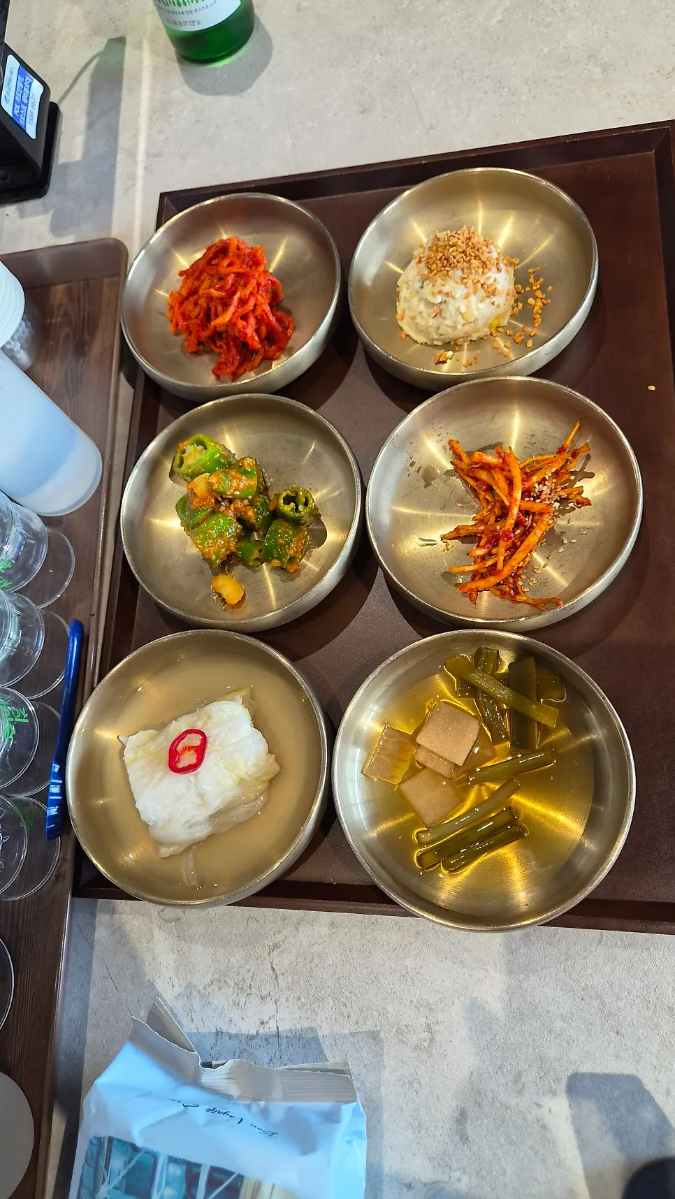 A generous spread of banchan side dishes