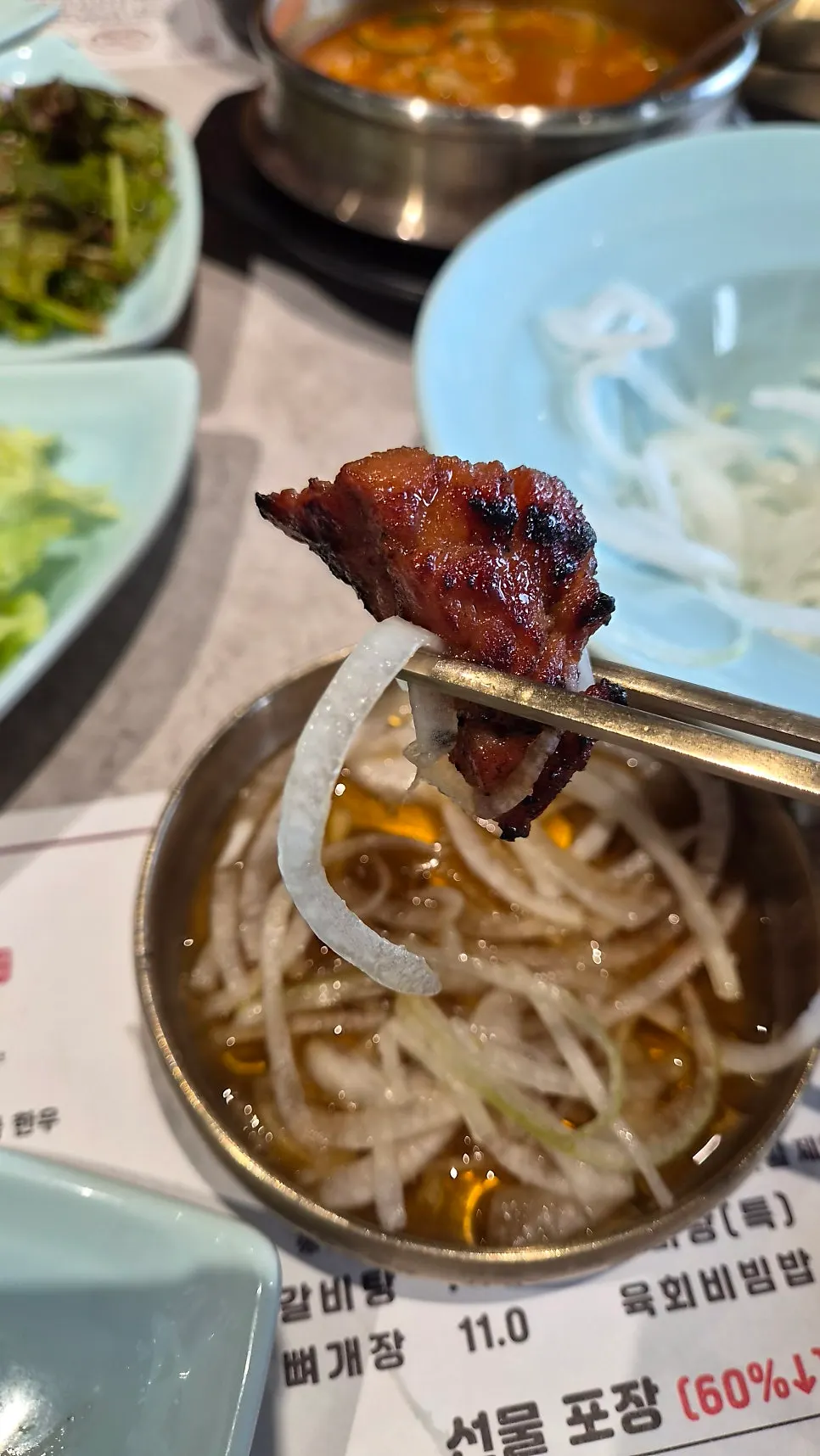 Charcoal-grilled pork galbi cut into bite-sized pieces