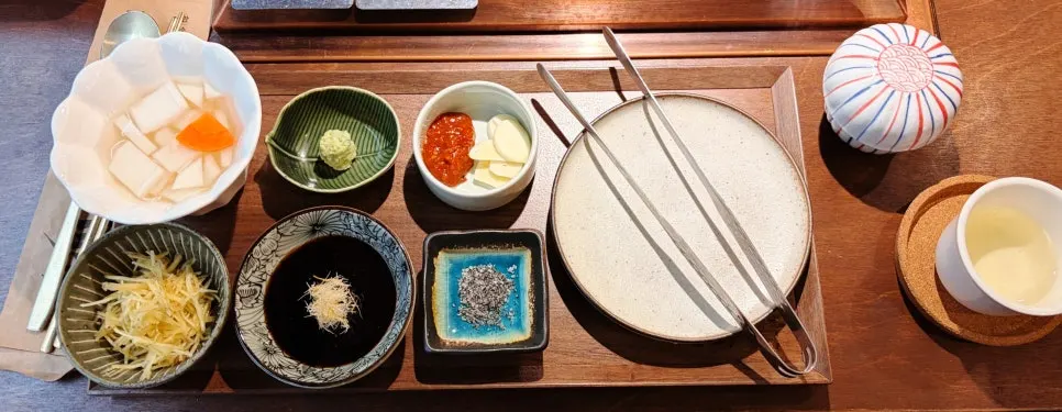 A cup of pre-meal green tea with grains