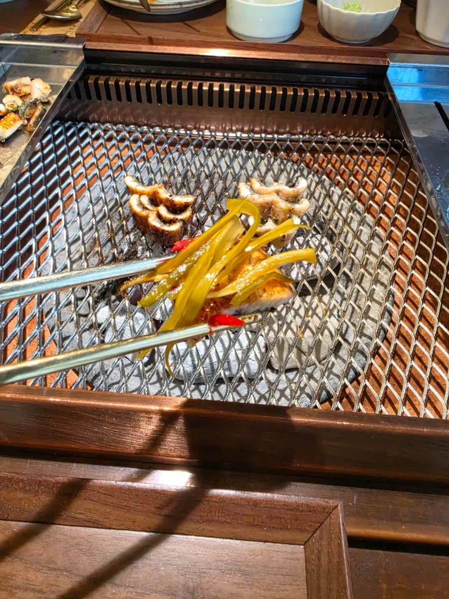 A full spread of charcoal eel eaten with rice
