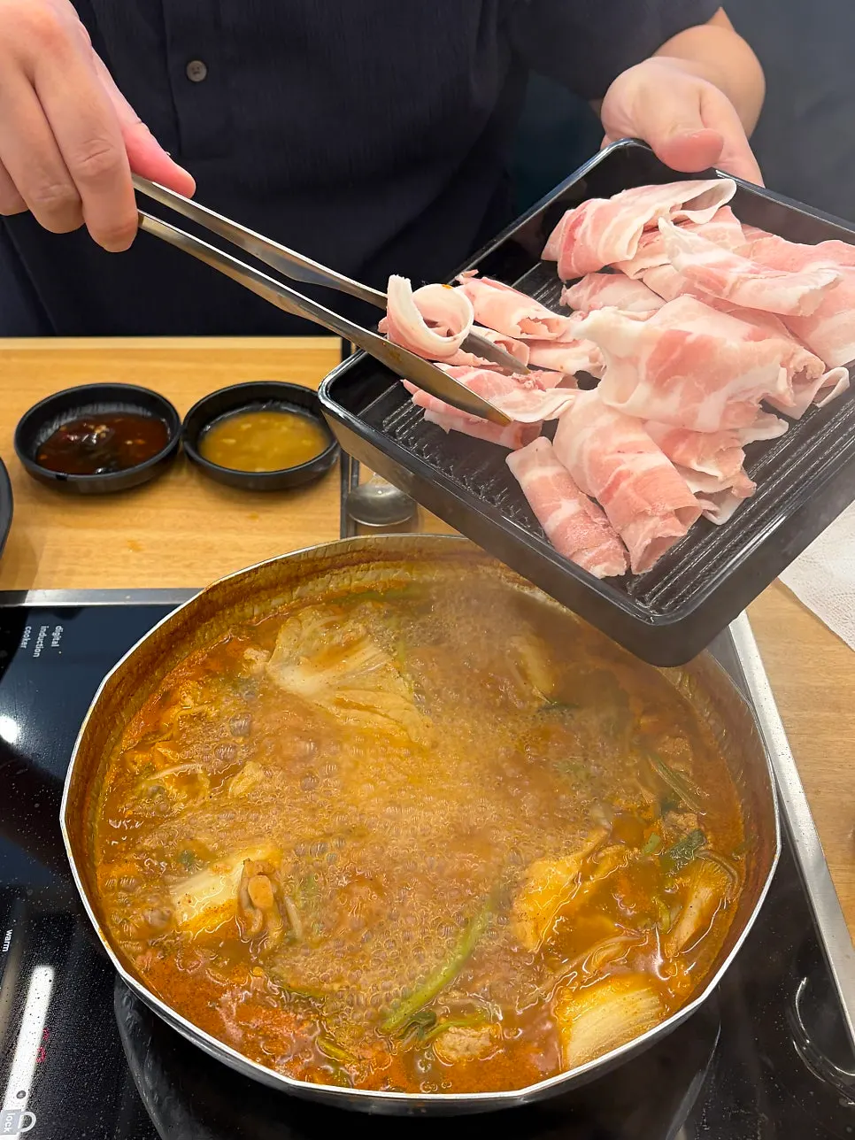 Plate of thinly sliced pork we added to the order