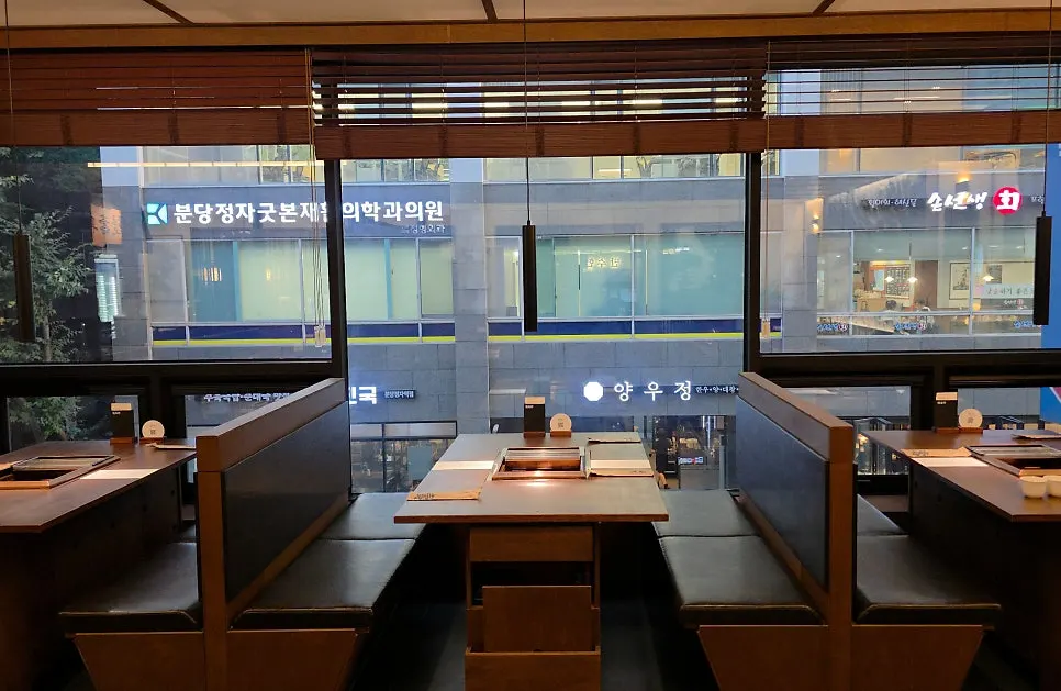 Interior of Mansuheon Jeongja with gray and wood tones