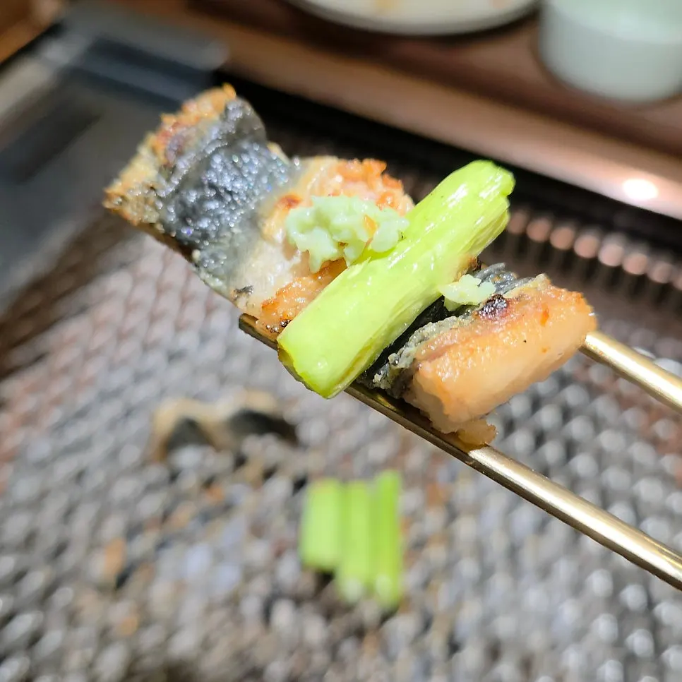 A piece of eel grilled over charcoal