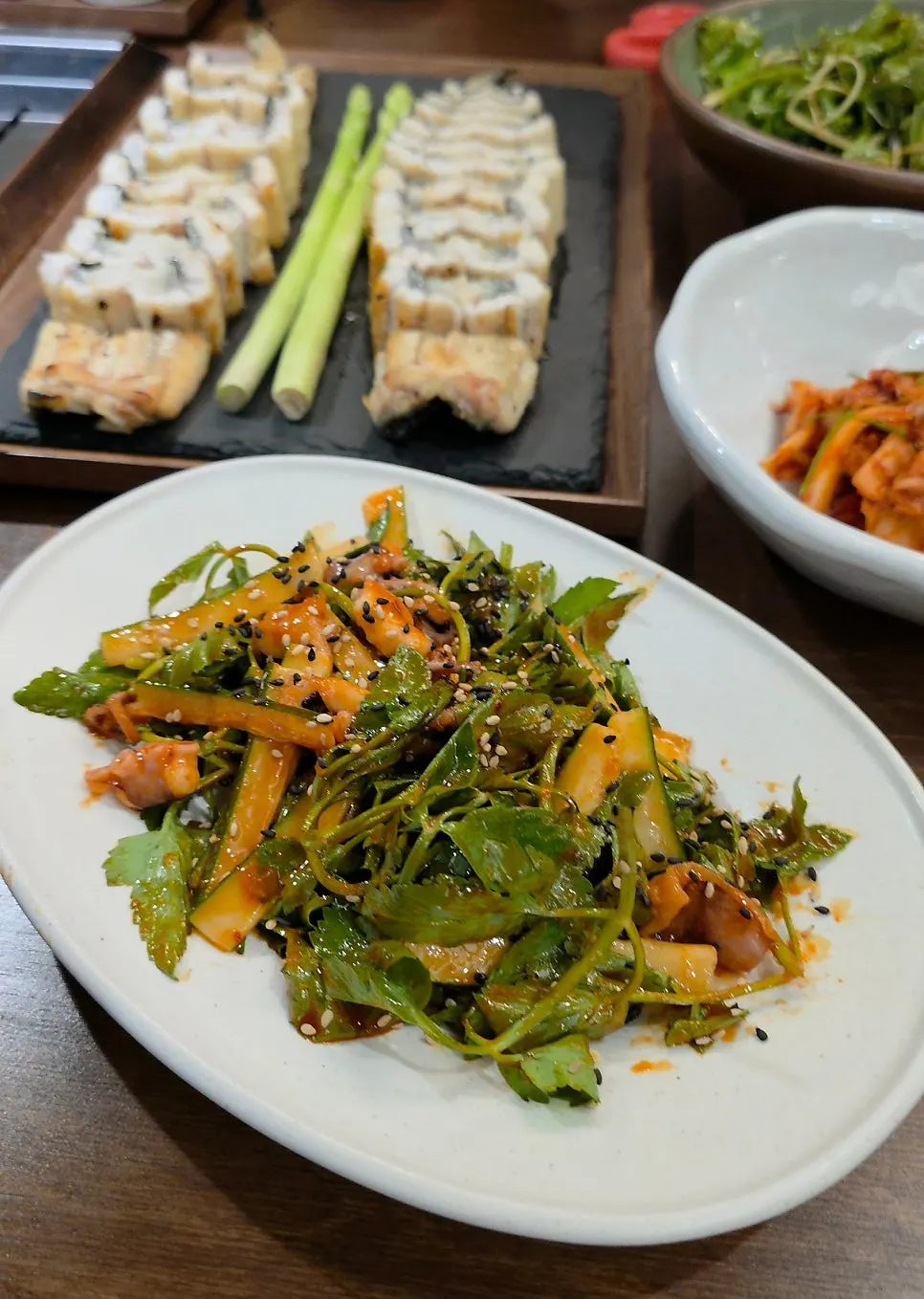 Octopus seasonal vegetable side dish served alongside the eel