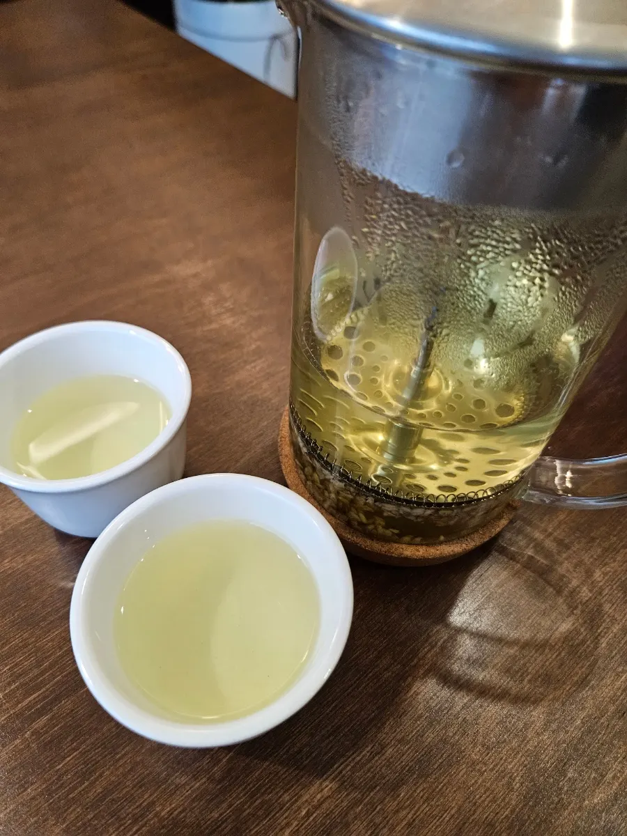 Warm buckwheat tea served before the meal