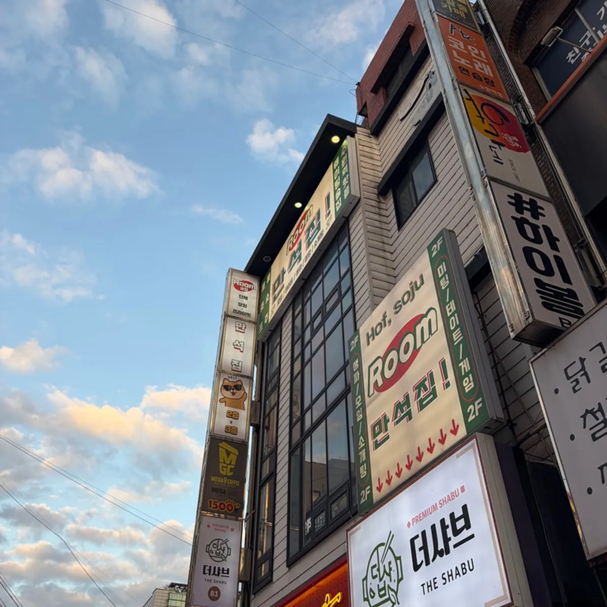 Building exterior signage for Manseokjip Suwon Station Branch