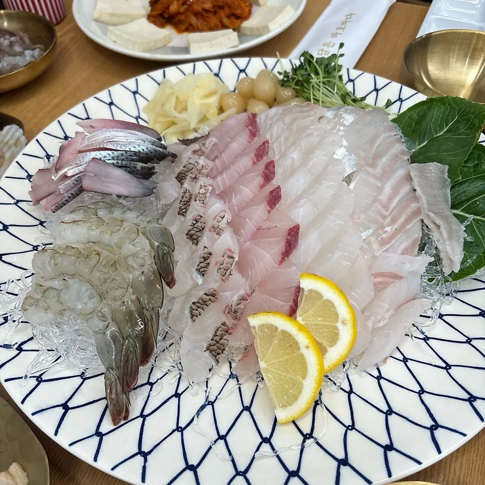 Signature set spread with mixed sashimi and seafood platter