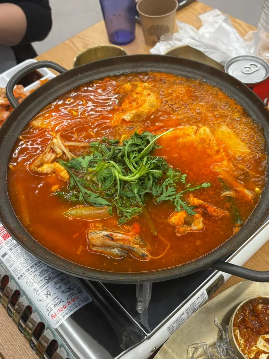 Pot of spicy fish stew for the final round