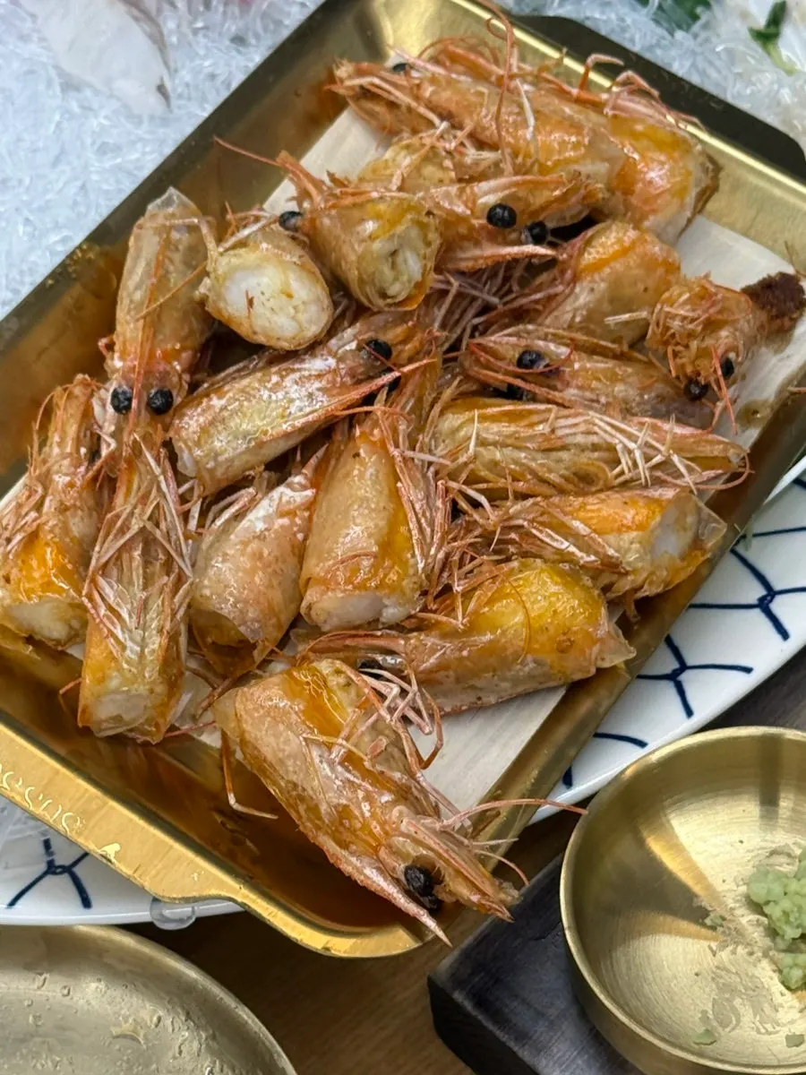 Shrimp body and head cut in half