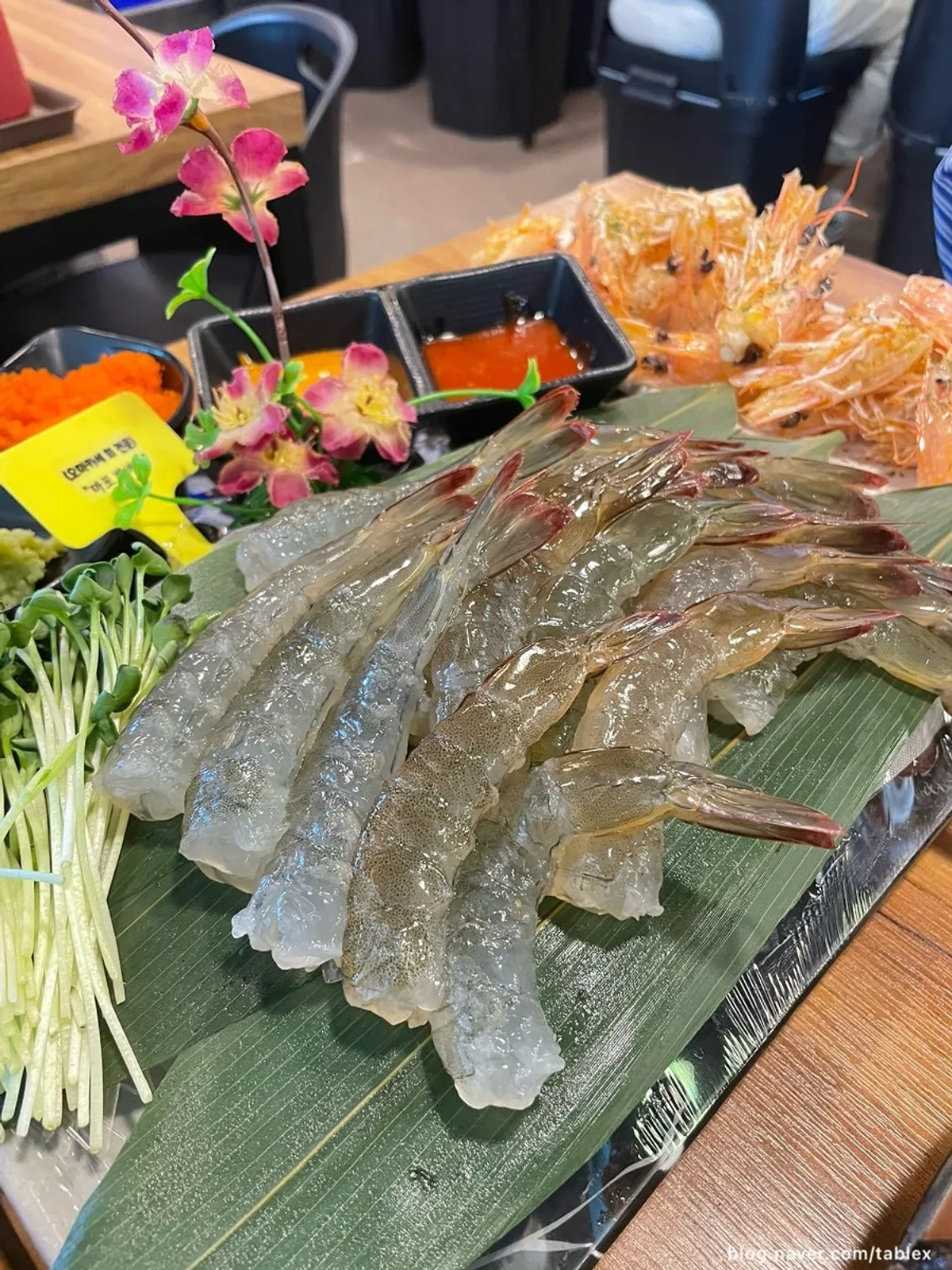 A plate of raw shrimp sashimi at Mapo Bamdada
